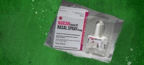 A two-pack box of Narcan NasSpray and a 4mg dose of Narcan on top of a green background.