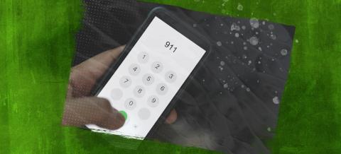 Image of a hand holding a phone that’s calling 911 on top of a green background.